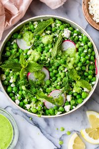 This spring, double Pea Salad recipe, made with blanched peas, minced shallot, feta cheese, and a creamy dressing made of more peas, yogurt, mint, and dill is super fresh and very easy! #peas #salad #springsalad #vegetarian #glutenfree #sidedish