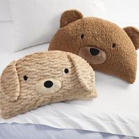 Make their bed extra cozy with this pair of cuddly companions. The whimsical bear and labradoodle designs are crafted with super-soft faux fur and huggably plush fill, and embellished with adorable appliques, embroidery and ears. DETAILS THAT MATTER Bear pillow is made of 100% polyester Sherpa. Labradoodle pillow is made of 80% acrylic and 20% polyester fur. Reverse fabric is made of 100% polyester velboa. Fill is 100% polyester. Features satin stitch face detailing on front of pillow. Yarn-dyed