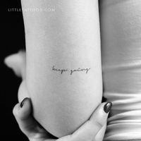 Set of three handwritten font 'keep going' temporary tattoos. Size: 1.7 in / 4.4 cm (width)