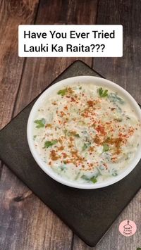 Healthy Lauki Raita  • 1 Katori - 60 Calories  Preparation Time - 15 Mins  • Serves - 1  • INGREDIENTS  • Grated Lauki - 1 Cup  • Hot Curd - 1/2 Cup  • Black Salt To Taste  • Jeera Powder - 1/2 tsp  • Coriander Leaves - 2 tbsp  • Red Chilli & Jeera Powder For Garnish  • .  • Steps  • ➡️ Grate Lauki and add to boiling water. Cover for 10 mins.  • ➡️ Mix together curd, jeera powder and black salt.  • ➡️ Squeeze and add lauki along with some coriander leaves.  • ➡️ Mix everything well. Sprinkle some Red chilli and jeera powder before serving.  • ➡️ You can also add rai Curry leaves tadka on it.  • ➡️ Enjoy as a side dish with Indian Meal.  Love ❤️   #raita #laukiraita #recipes #lowcal #summerrecipes #curd #raitas #indiancuisine #reeltoreel #curdrecipes #buttermilk #probiotic #indianfood #d