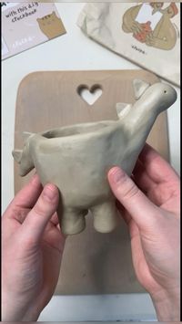 the cutest diy clay project! DIY dino cup or planter using one of our at home clay kits. Super fun gift idea #clay #pottery #clayinspo #diyclay #diyideas #diyinspo #diyplanter #crafts #diytutorial