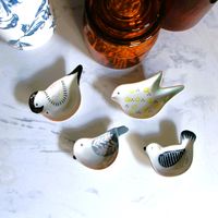 This adorably handpainted stoneware bird shaped trinket dish makes a sweet little gift for yourself or someone special. There are 4 styles. Each style is numbered for easier ordering. 3-3/4"L - 4-1/4"L Hand-Painted Stoneware Bird Shaped Dish Food Safe