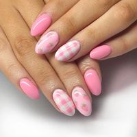 These nails feature a delightful pink hue with charming strawberry and gingham patterns, evoking the playful essence of summer picnics.  🌸Click on the image to shop our trending Korean Gel Polish this season.  🌸Credit: jenna_nailedit on Instagram 🌸summer nails, pink nails, strawberry nail art, gingham nails, Korean gel polish, trendy nail art, summer manicure, cute nail design, picnic nails, fresh nail look, summer vibes, pastel nails, seasonal nail art, stylish nails, summer fashion, nail trends 2024, Instagram nail inspiration, floral nails, summer beauty, nail art ideas.