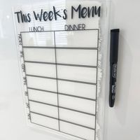 This Week's Daily Menu Food Planner Painted A4 Clear Acrylic Wipeable Sign The sign can come with a double-sided removable sticky strip to enable the sign to stick to the fridge/wall. This means you can take off to write and place it back on the wall/fridge easily.  Alternatively can be propped on a worktop surface. Made from 2-3mm acrylic - A4 / 210 x 297 mm in Size. Comes with a magnetic dry-wipe pen BUT if a black paint background is selected it will come with a non-magnetic white chalk pen.