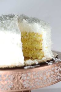 If you love coconut, or even if you don't, this Easy Coconut Cake is quite delicious!  It's moist, creamy, melt-in-your-mouth incredible!  #easy #coconutcake #moistcake