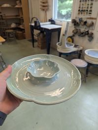 This plate features a separate bowl in the center for a dip and the other section is for chips, vegetables, or whatever you choose. This plate is about 8 inches wide, and the bowl in the center measures 3 and a half. I took a ceramics class in school and fell in love and now I have a pottery wheel in my basement.