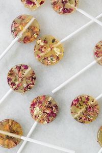 These delicious and easy homemade rose lollipops from Sugar and Charm will definitely impress your guests. They're made with edible flowers and edible gold!