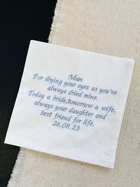 "Our message handkerchief is sure to get those happy tears flowing. It's the perfect Mother of the Bride gift.  Text Reads: Mum, For drying your eyes as you've always dried mine.  Today a bride, tomorrow a wife,  always your daughter and best friend for life.  Date Want a different colour thread? Just send us a message of what you'd like and we'll be in touch. 16\" x 16\" Made-to-order: This item is handmade in our Warwickshire studio by our wonderful team. This item is made-to-order so we do no