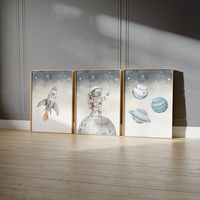 Step into a whimsical world of cosmic wonders with this enchanting set of 3 nursery space themed prints. Perfect for a boy's nursery, these prints bring the mysteries of the galaxy right into your little one's room. Each print features its own unique space theme, from twinkling stars to planets in orbit, igniting the imagination and fostering a love for exploration. Crafted with vibrant colors and intricate details, these prints add a touch of celestial charm to any nursery decor. Transform the