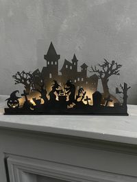 Step into the realm of Halloween enchantment with our bewitching decor, perfectly sized at approximately 16 inches! These hauntingly beautiful pieces are designed to add a touch of spooky charm to your Halloween celebrations. From intricately detailed haunted houses to eerie witch silhouettes, our 16-inch decorations are ideal for tabletops, mantles, and creating a spine-chilling atmosphere in any room. Each piece is meticulously crafted to capture the essence of Halloween magic. Explore our exc