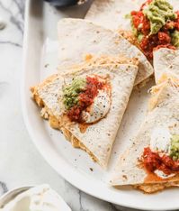 Easy and delicious Chicken Quesadillas, baked in the oven and ready in minutes.