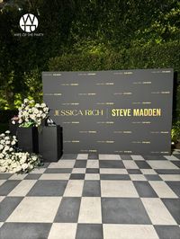 Guests were welcomed by a striking black and gold step and repeat, showcasing Jessica's favorite shoes on sleek black podiums, all accented with elegant white floral installations.  #wotp #thewotp #wifeoftheparty #partyplanner #eventplanning #thewotp #thewifeoftheparty #event #eventplanner #events #losangelesevents #wecelebratepeople #loriannserna #stevemadden #stevemaddenxjessicarich #shoes #collaboration #thependrywesthollywood