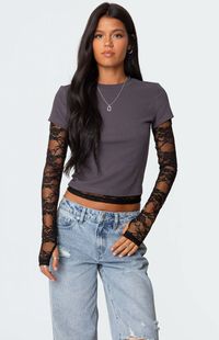 This Edikted Layered Lace Sleeve T-Shirt gives the perfect twist on a closet staple. With its layered look, it's a fun yet versatile piece that adds some edge to a basic outfit.Long sleeve T shirtSheer lace sleevesThumb holesLayered lookPolyester, Rayon, SpandexModel wears size SModel height is 5'8Item care: Machine wash at maximum 30C, do not bleach, do not tumble dry, iron at a maximum of 110C, do not dry clean. Edikted Womens Layered Lace Sleeve T-Shirt - Gray size Large