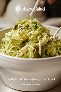 Pin this for later!🥗 This Greek cabbage salad is the perfect recipe for a BBQ, or any time. It is healthy, flavorful, and a great spin on traditional coleslaw.  To a large bowl add the shredded cabbage and sprinkle over the salt. Use your hands to massage the cabbage with the salt for a few minutes – this helps to just slightly soften the cabbage. To the cabbage add all of the remaining ingredients (pepper, olives, feta, dill, olive oil, red wine vinegar and dried oregano) and toss well.