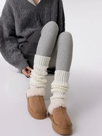 Blended cotton leg warmers, 40 cm (15.7 in) in length, fit shoe sizes 5.5 - 8 (US) | 35 - 39 (Asian). One size fits most for a cozy and versatile experience.