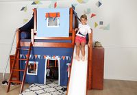 A twin mid loft bed with slide is just the right height for older kids, providing additional headroom underneath the bed and more steps and height to climb and slide.