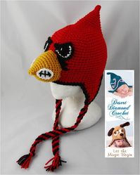 Crochet Pattern 056 - University of Louisville Cardinal Hat - All Sizes  This listing is for the PDF pattern only and not the finished product.  Materials Needed: Red Heart Super Saver  1 skein Cherry Red Small amounts of Black, White, Gold  Fiberfill Yarn Needle F, H hook (or size needed to obtain gauge)  Gauge:  With "H" hook, 4 SC Rows = 1" 3 SC Stitches = 1" Stitches: CH:chain DC:double crochet HDC:half double crochet SC:single crochet SC DEC:single crochet decrease SLST:slip stitch Skill Level - Easy  Makes Sizes:  14" - 16" (0-3 Month) 16" - 18" (3-6 Month) 18" - 20" (6 Month - ? - Measure head) 20" - 22" (child / teen / adult - measure head)   NOTE  Sale of this item is Final!   You can sell any items you make from using my patterns, but you are responsible for your finished items.