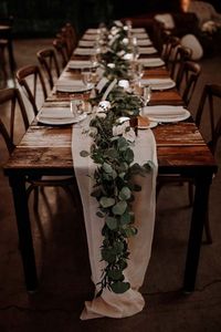 GREENERY RUNNERS. 20 Stunning Tablescape Ideas for a Boho Wedding  #purewow #flowers #decor #wedding #weddingdecor #weddinginspiration #weddingtablescapes #bohoweddings #bohobrides #weddingdecorations #weddingtables #weddinggreenery