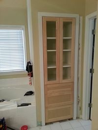 Built-in bathroom linen cabinet