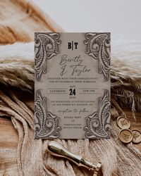 With the appearance of hand tooled leather this beautiful rustic invitation adds the perfect touch to announce your special day. It can be edited and personalized to meet your needs at Corjl.com after purchasing. This listing includes: -  5x7 Invitation - 5x3.5 RSVP card - 5x7 Photo card that may be used as a front to invitation or as a save the date card - 4x6 Details card  FREE DEMO  -Try it before you buy it! -Copy and paste this URL in your web browser https://www.corjl.com/d/380EB2  WHY CHOOSE A LISTING CREATED WITH CORJL?  - There's no waiting! You'll have access to your item right after purchasing. - No need to download any software. You can personalize this item right from your browser. - Personalize using your computer, or make basic edits using your phone or mobile device. - Easy