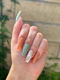 Length: Medium Type: Coffin    GelxNails *Nails can be reused depending on customer care* Colors: Olive Green, Rust Orange, White, Gold Glitter   What's Included?: - Nail Set - Nail Glue - Nail Buffer  - Nail File  - Cuticle Pusher - Alcohol Wipe - Step-by-step Instructions Can't find what you're looking for? Send us a message with a photo of your nail design! Want a different nail length and style? Send us a message!