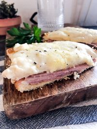 A Croque Monsieur is a classy French sandwich with ham in the middle and a bechamel sauce on top with melted gruyere cheese.