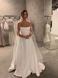 wedding dress inspo 2023, dream wedding dress, floral veil, bridal inspo, two piece wedding dress, strapless wedding dress, wedding gown, kyha studios nyc, where to shop for wedding dresses in nyc, wedding aesthetic, luxurious bridal gown, wedding ceremony dress, satin wedding dress