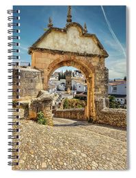 The spiral notebook is 6" x 8" in size and includes 120 pages. The inside of the back cover includes a pocket for storing extra paper and pens. #Ronda #Spain #Notebook