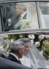 Arriving with their proud papa, Michael Middleton.