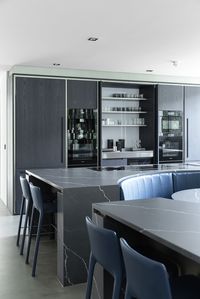 Corner kitchen with a bespoke island complete of seating