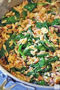 Orzo Pasta with Spinach and Parmesan is an easy recipe using fresh ingredients to maximize flavor. It makes an impressive side dish, but if you want an easy all-in-one meal, just add chicken for a delicious dinner that's quick and easy any night of the week. #LTGrecipes #pasta #orzo #spinach #side #easyrecipe