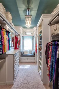 Pretty closet or wardrobe for master bedroom - teal ceiling and chandelier