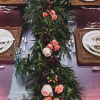 Wedding flower garland with pink and white roses and purple protea