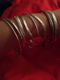 Silver bangles.