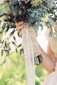 top off a vintage style bouquet with lace | wendy laurel photography | via: wedding wire