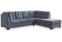 This sectional with chaise takes a homey approach to high style. Its denim-inspired fabric has classic versatility, while a contemporary silhouette and stitched details keep the look totally on trend. And you can count on comfort—the chaise invites you to kick back and stretch out.