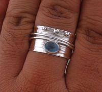 925 Sterling Silver Natural Aquamarine Spinner Ring. Available in different size. Gemstone Name: Natural Aquamarine Metal: 925 Sterling Silver Ring Size: Optional Quantity: 1 Piece