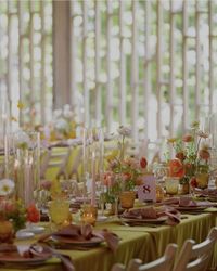 Beautiful 70s inspired wedding with amber goblets, green and pink tablescapes, assorted florals - North Country Vintage Specialty Rentals