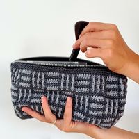 Now you can crochet a cute makeup pouch in a mosaic pattern. It is super cute, crocheted in Rainbow 8/4 Glitter, and can be used for much more than just makeup. You could use it to store your crochet hooks or something entirely different. Crochet it in 2 contrasting colors to show off the mosaic effect. Enjoy!