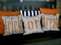 LOVE these trick or treat pillows! Made with a canvas drop cloth from Walmart and Krylon's Glitter Blast spray paint!