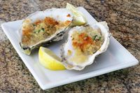 These easy baked oysters are cooked with a buttery panko crumb topping and fresh herbs. Impress your guests with this tasty appetizer!