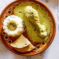 Pipian verde is a flavorful and hearty Mexican prehispanic sauce made with pumpkin seeds, peanuts, sesame seeds, leafy greens, and spices. It is perfect to