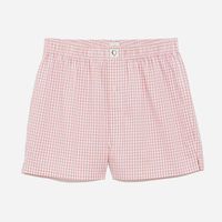 Made from luxurious cotton poplin, our unisex boxer shorts offer a comfortable option for your bedtime routine. Our cotton boxer shorts feature a relaxed fit, button fly, and a soft elastic waistband that ensures a snug fit without being restrictive. The lightweight fabric offers breathability and comfort for a peaceful night's sleep and a stylish look that is perfect for lounging at home.