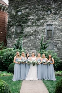 A dreamy dusty blue and rustic blue wedding theme at Castle and Key Distillery brings together light blue wedding aesthetics and farmhouse elegance for an unforgettable day. Photography by: Honey & Bee Photography.