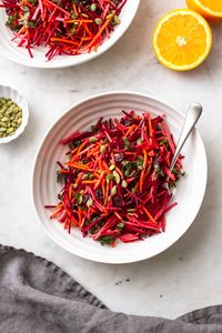 Fresh and colorful, this easy, vegan Apple, Beet, Carrot and Kale Salad is full of nutrition and flavor! Less than 10 ingredients and ready in under 15 minutes. Healthy, clean eating, detox salad!