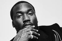 Robert Rihmeek Williams (born May 6, 1987),[2] known professionally as Meek Mill, is an American rapper, songwriter, and activist.[3] Raised in Philadelphia, he embarked on his music career as a battle rapper, and later formed a short-lived rap group, The Bloodhoundz. In 2008, Atlanta-based rapper T.I. signed Meek Mill to his first record deal. In February 2011, after leaving Grand Hustle Records, Mill signed with Miami-based rapper Rick Ross's Maybach Music Group (MMG). Mill's debut album, Drea