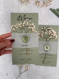 Sage Green Gypsophila green card wedding menu What's included: Dimensions: 10cm x 20cm 1 x Menu 1 x Vellum overlay personalised with guest name  Materials: 280gsm Card Vellum Overlay Wax Seal Stamp ----------------------------------------------- SAMPLE PACKS ----------------------------------------------- It can be quite daunting trying to find the perfect invitation for your wedding, to help ease this process we offer a sample pack. This sample will be un-personalised but will include the exact quality and package you can expect to receive from us. ---------------------------------------------- HOW TO PLACE AN ORDER FOR YOUR ACTUAL INVITATIONS ----------------------------------------------- 1. All of our invitations have a sample listing and a listing where you can purchase your actual in