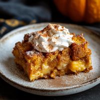 Easy Pumpkin French Toast Bread Pudding - Cozy & Comforting Fall Dessert - Perfect for Brunch - Digital Download 🎃My Easy Pumpkin French Toast Bread Pudding recipe is so quick and so good it will be your go to for weekend breakfasts. This rich, bread pudding is has pumpkin spices and soft bread soaked in a pumpkin-spiced custard. Perfect for cozy fall mornings, brunch, or a sweet dessert, it's an irresistible twist on classic bread pudding that everyone will love. What You'll Get: 🌻Easy Pumpkin French Toast Bread Pudding Recipe: A detailed, beginner-friendly guide to making a delicious pumpkin bread pudding with French toast flavors. 🍁Why You'll Love It: 🧡Fall-Inspired Comfort: Warm, spiced pumpkin flavors combine with soft, custardy bread for a dessert (or brunch!) that feels like a c