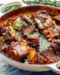 Make dinner special with these tender Guinness Braised Short Ribs, braised in rich stout for a unique, flavor-packed dish! #guinness #braised #shortribs #recipe