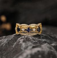 Gorgeous vintage-inspired royal blue sapphire wedding band, a stunning piece of jewelry perfect for all occasions. Handmade with care and attention to detail, this ring is made to order in Canada and ships from a small business. You have the option to choose between sterling silver or solid gold when crafting this ring and features beautiful lab-grown blue sapphire. ►RING DETAILS: ✦Material: 925 sterling silver, Solid 10k/14K/18K GOLD (can be made in white/rose/yellow gold) ✦Band Width:  mm ✦Mai